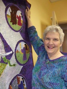 Rosie putting up quilt Rosie Rhine custom quilter and quilt