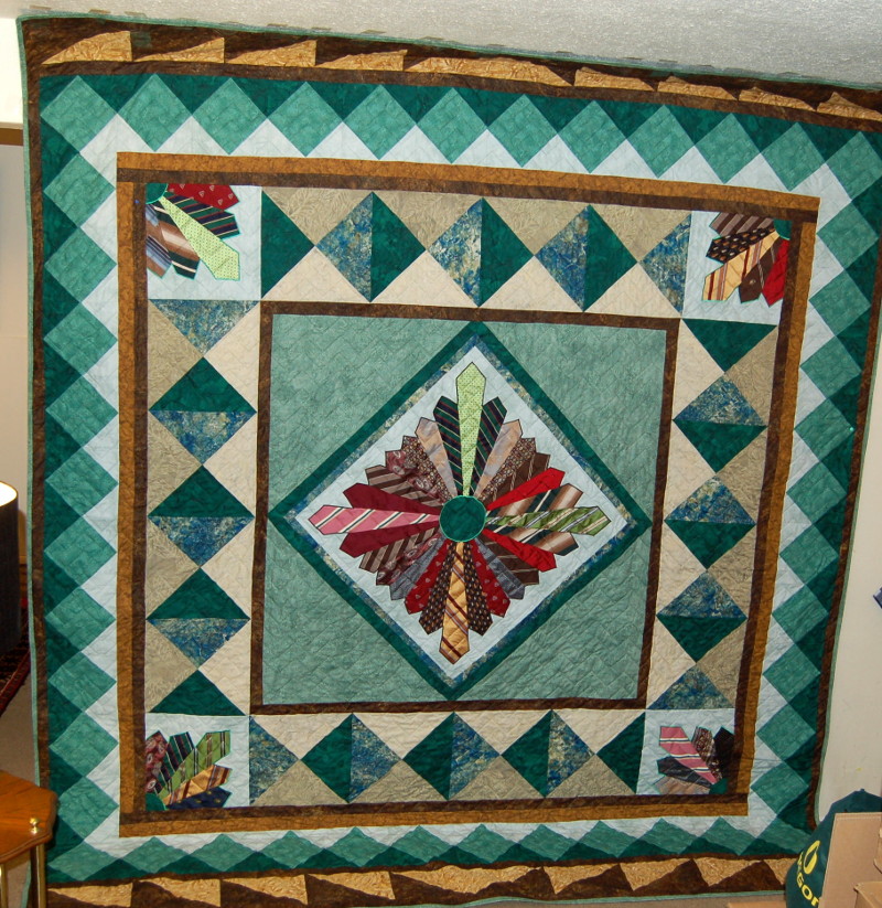 Bereavement quilt for grandson featuring granddad's ties in the center